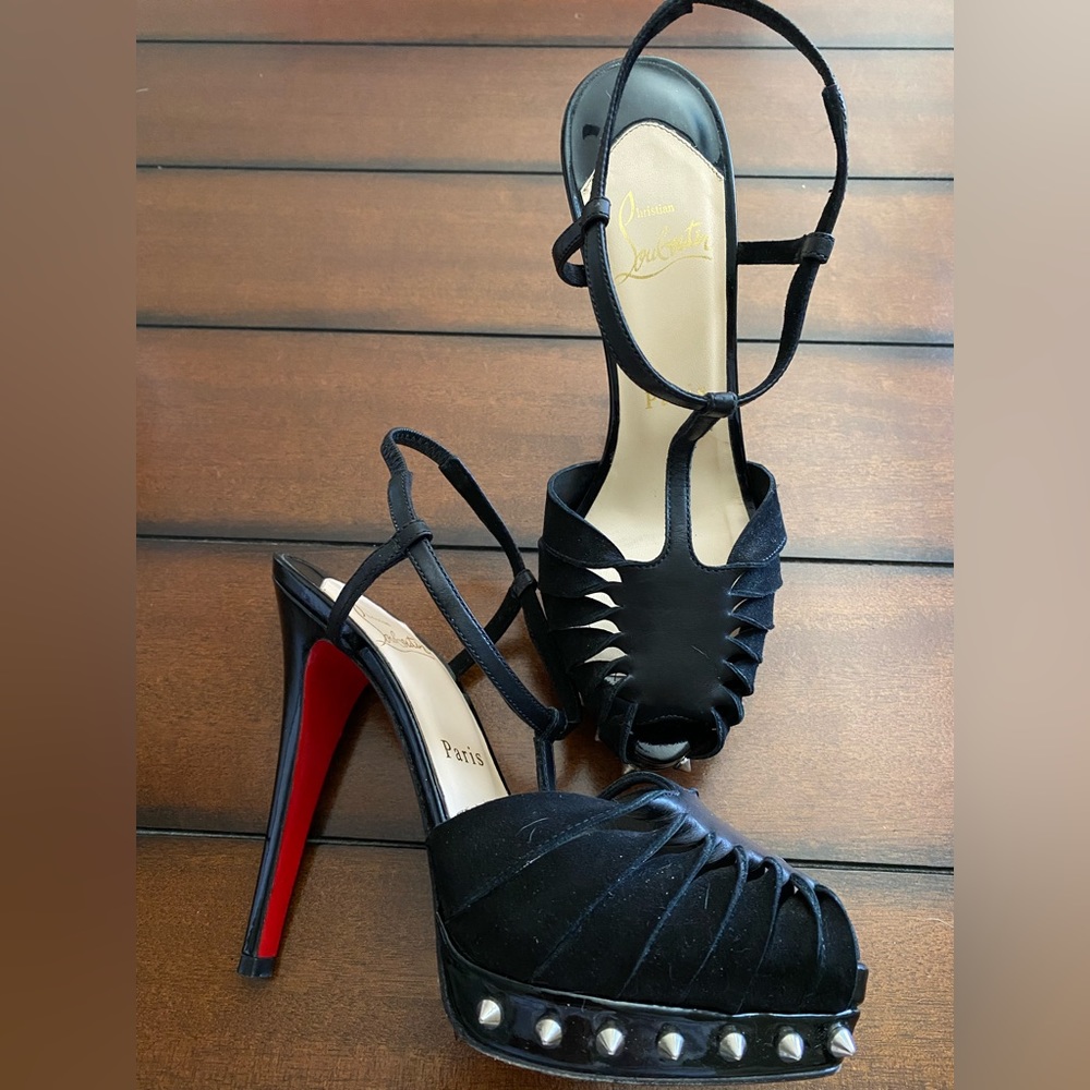 Authentic Christian Louboutin black heels.
